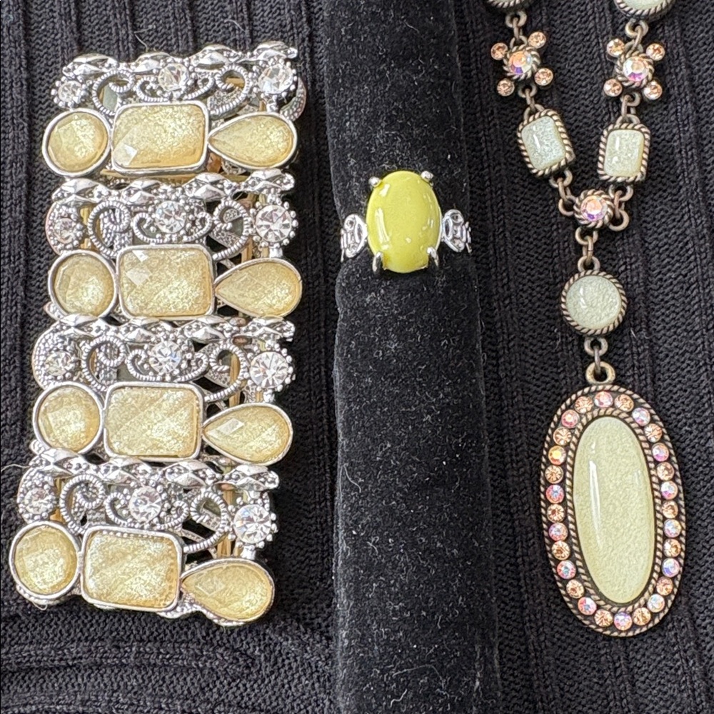 Elegant Silver and Gold stretch Bracelet with matching Avon necklace and ring